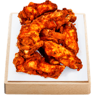 Gegaarde kipkluifjes pittig Foto van Gegaarde kipkluifjes pittig