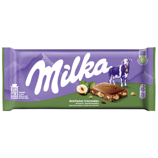 Foto van Milka Chocoladereep gebroken noten op witte achtergrond