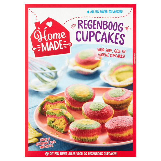 Foto van Home made Complete mix regenboog cupcake op witte achtergrond