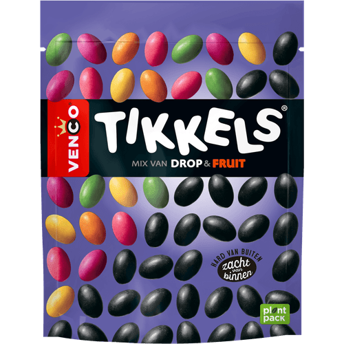 Foto van Venco Tikkels drop en fruit op witte achtergrond