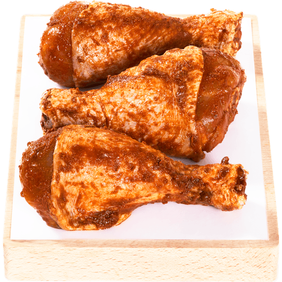 Foto van Actie kipdrumsticks korean bbq op witte achtergrond