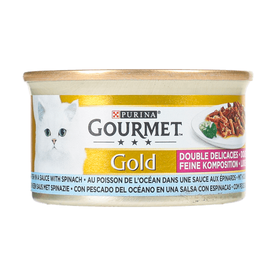 Foto van Gourmet Gold luxe mix met zeevis in spinaziesaus op witte achtergrond